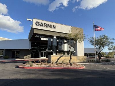 Exterior of the Garmin building at Mesa Gateway Airport with an American flag