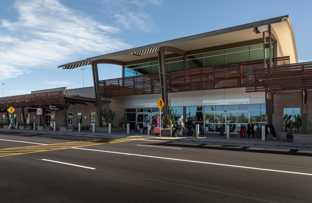 Street view of the terminal building and its covered entrance