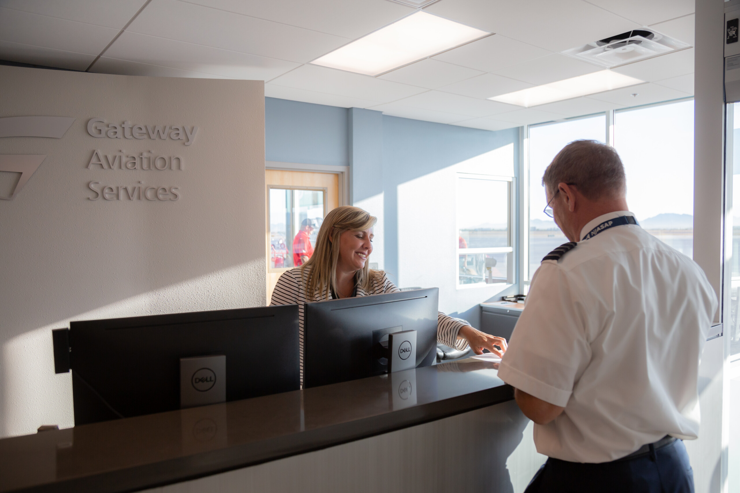 Pilot checking in at the Gateway Aviation Services front desk