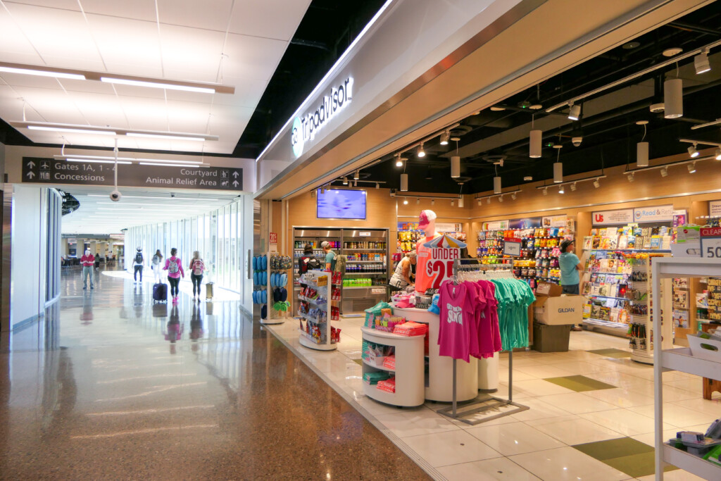 Concourse shop selling apparel and travel goods